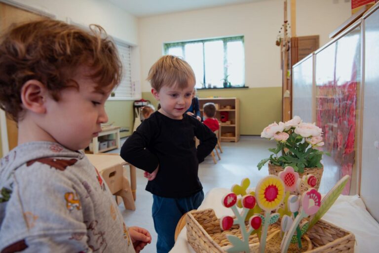Children Admiring Flowers