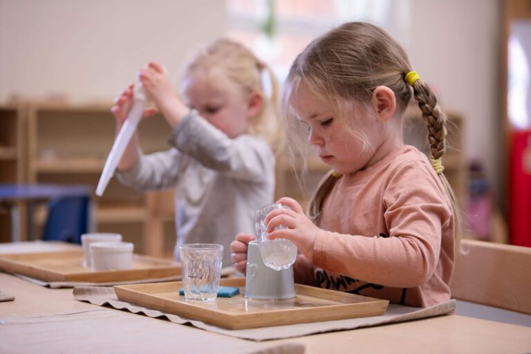 Nursery Child Pouring Water into a Mug