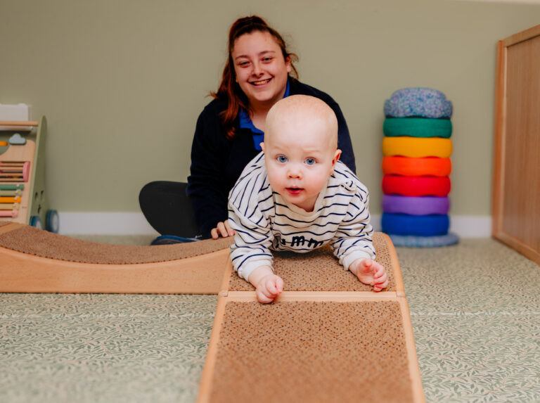 Baby Developing Movement on Soft Play Ramp