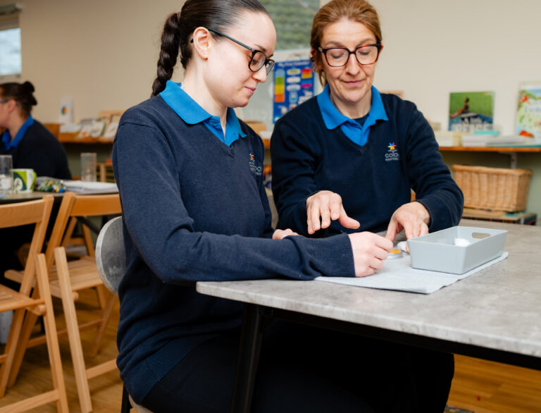 Nursery Staff Supporting Hands-On Learning