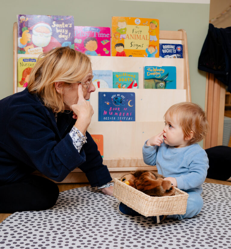 Child Learning with Nursery Practitioner